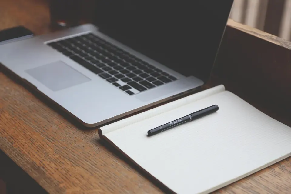 desk, laptop, notebook, pen